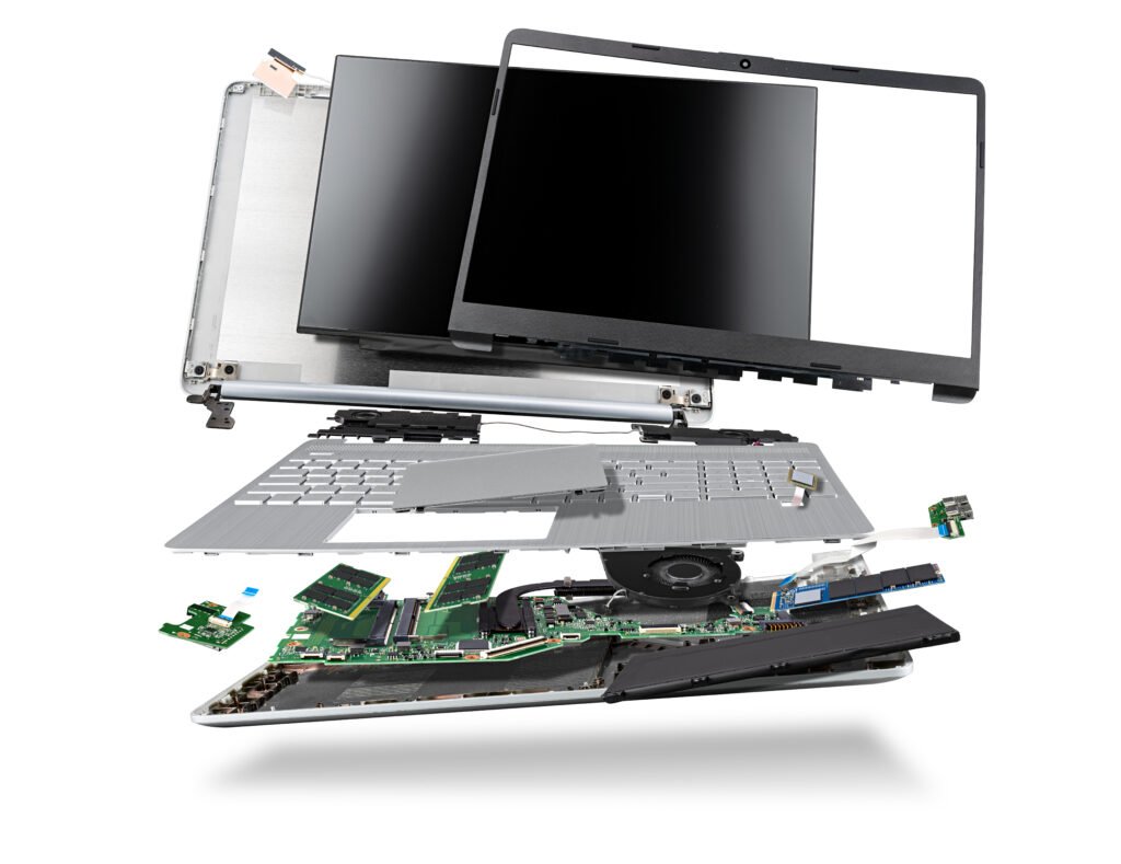 flying parts of a notebook computer. hardware components mainboard cpu processor display ram cables and cooling fan flying out of silver laptop pc case isolated white exploded view background